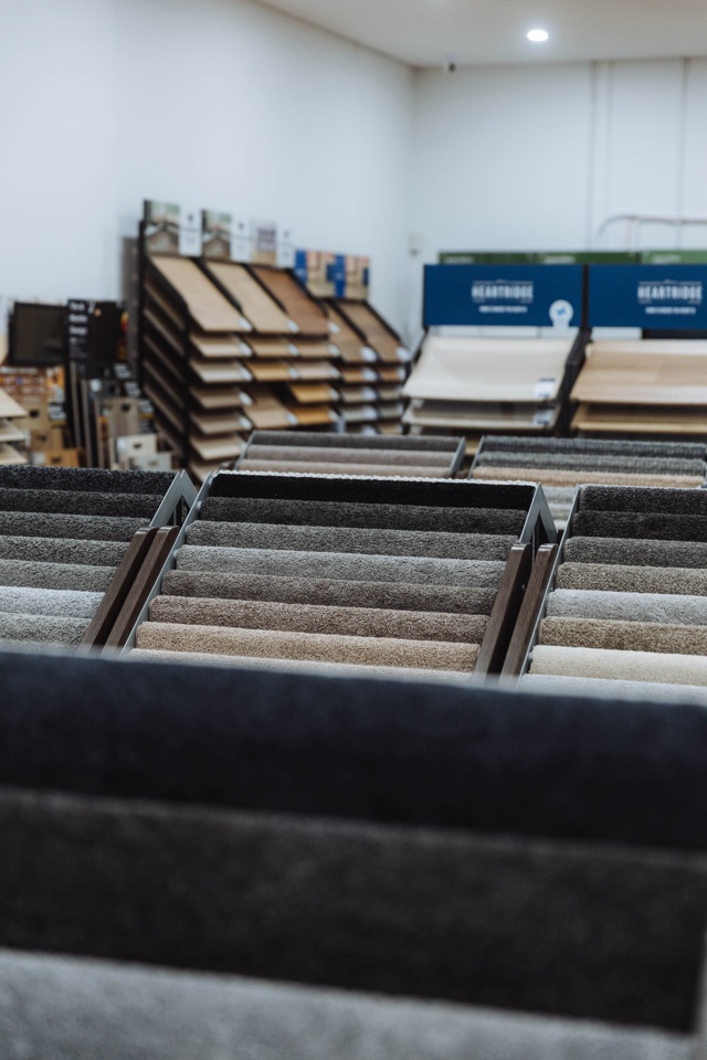 Carpet samples fanned out across the showroom
