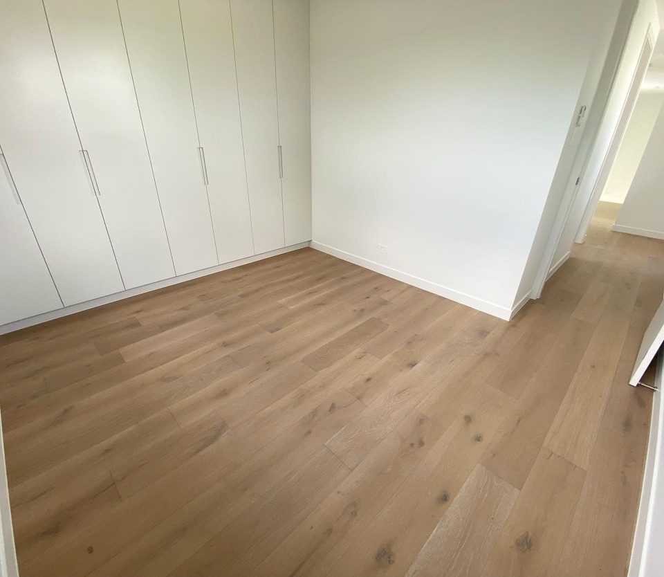 Engineered oak meets floor to ceiling wardrobes