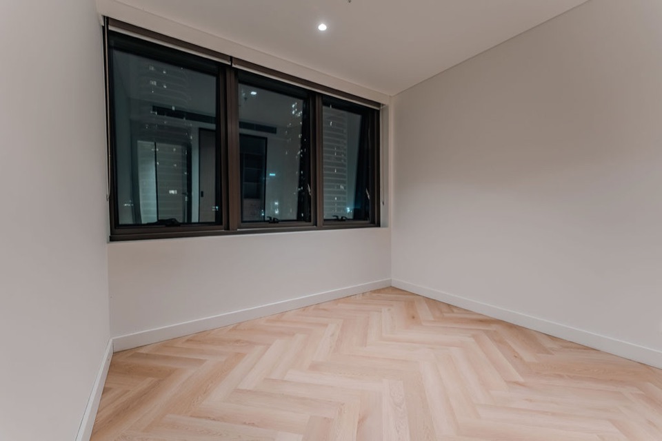 Herringbone laid corner to corner in the bedroom