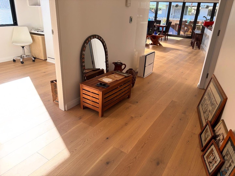 Oak boards running through to the balcony doors