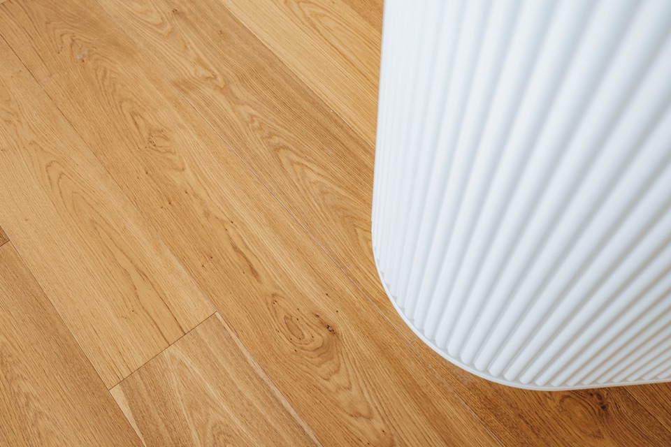 Oak meeting the fluted base of the kitchen island