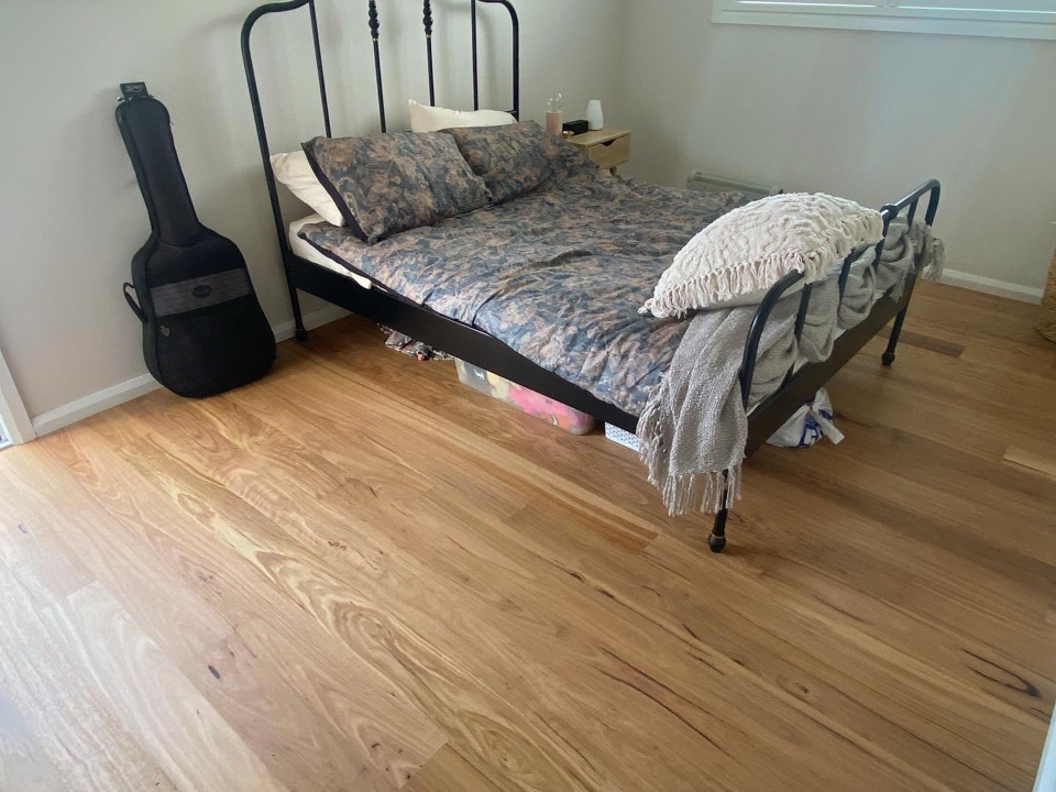 Wirebrushed blackbutt underfoot in the bedroom