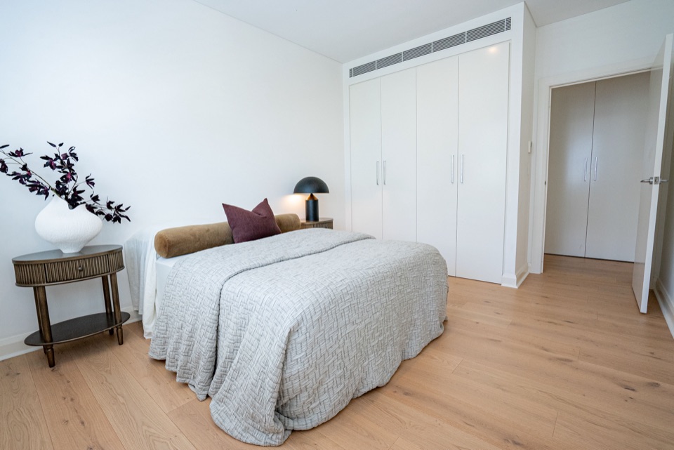 European oak carries into the bedroom
