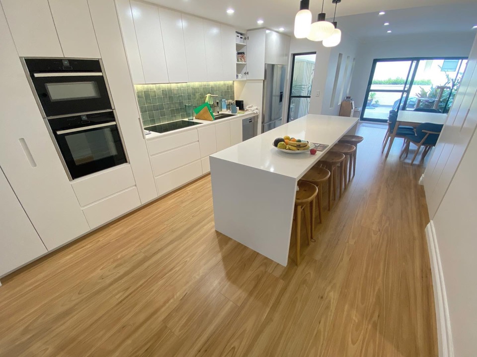 Blackbutt laminate runs from kitchen through to dining